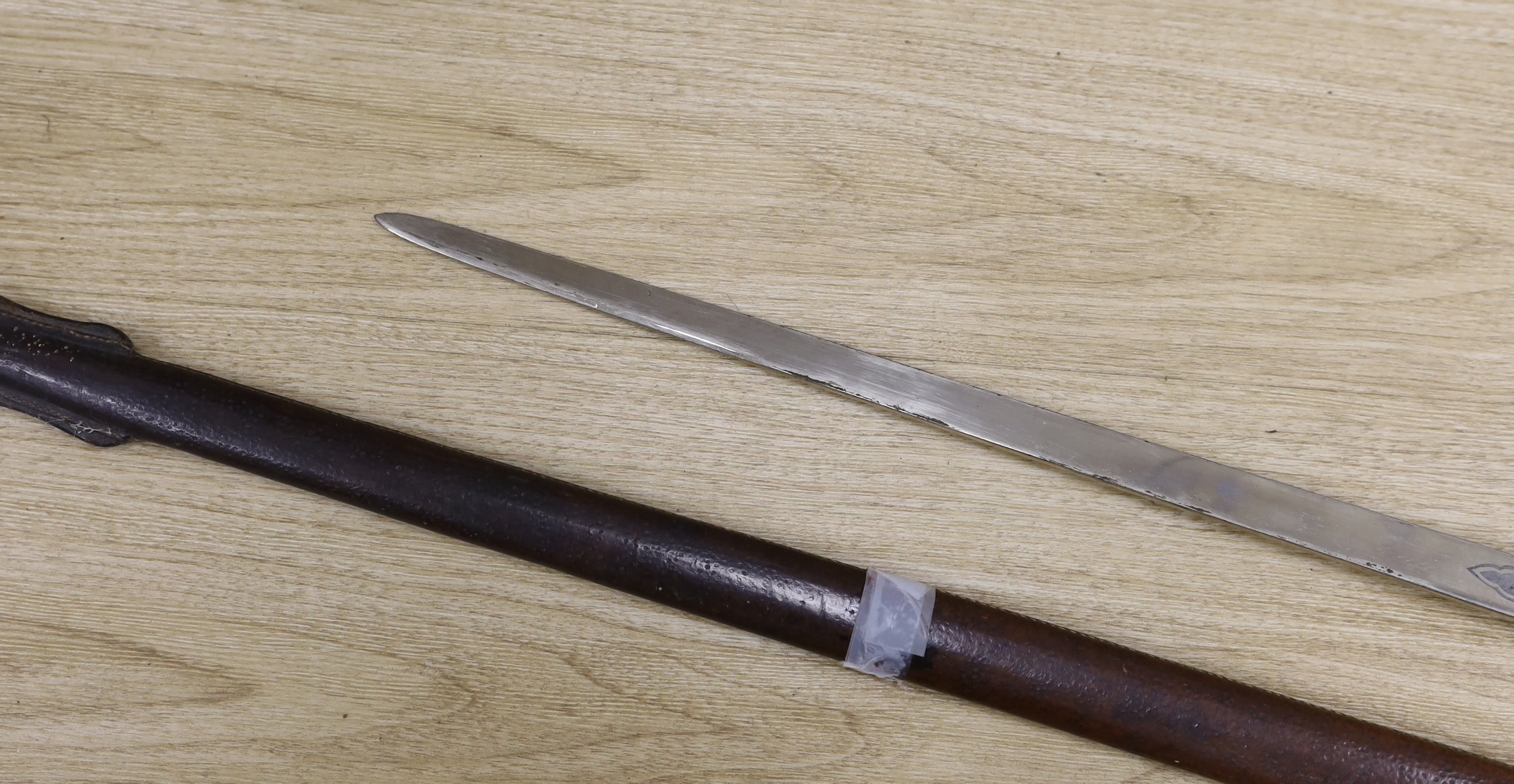 A George V officer's dress sword by Army & Navy Stores Ltd., blade 83cm, within leather scabbard